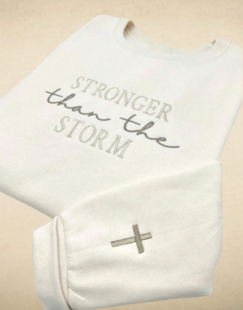 "Stronger than the Storm" crew neck sweater